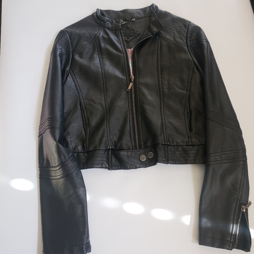 Black leather jacket with floral print inside